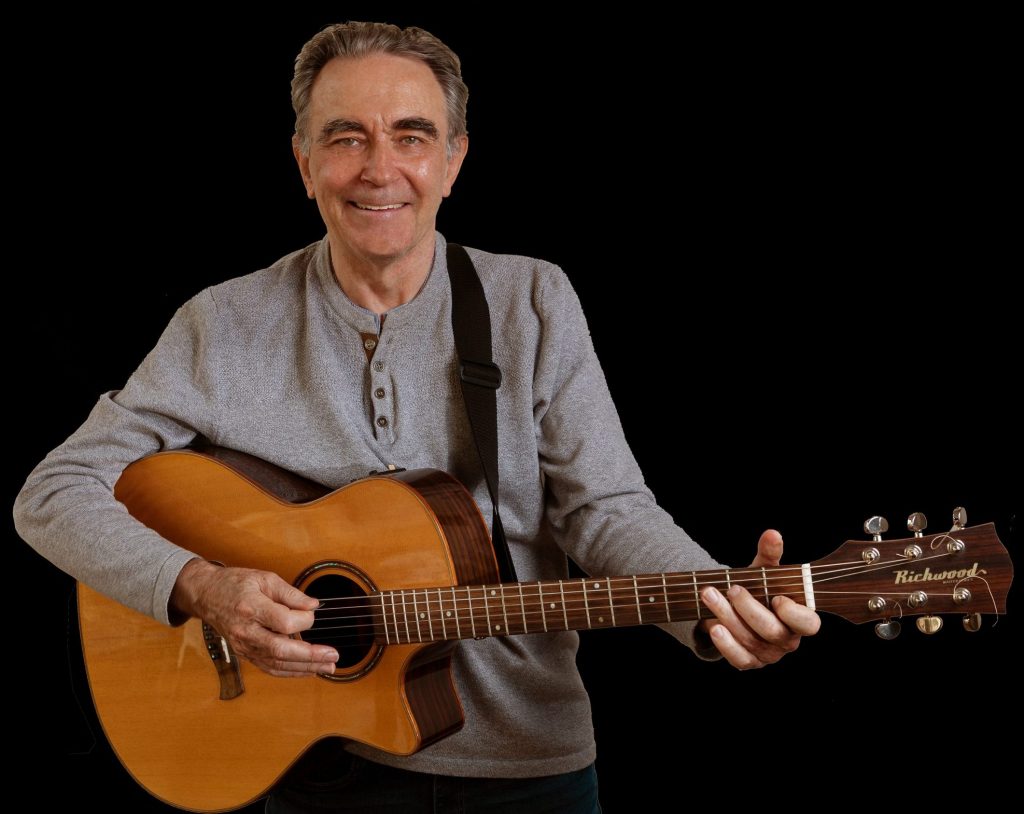 Henri Lequien à la guitare